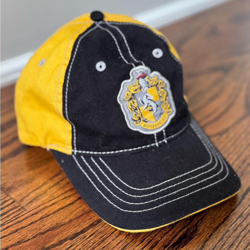 Harry Potter Hufflepuff hat from Universal Studios, yellow, and black
